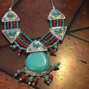 Turquoise silver and coral colored necklace